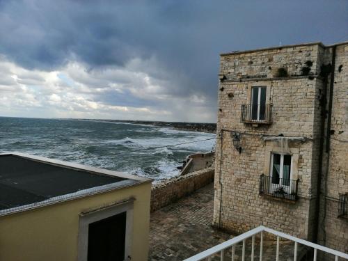 a view of the ocean from a building at B&B VISTAZZURRA - Casa Saldarelli in Giovinazzo