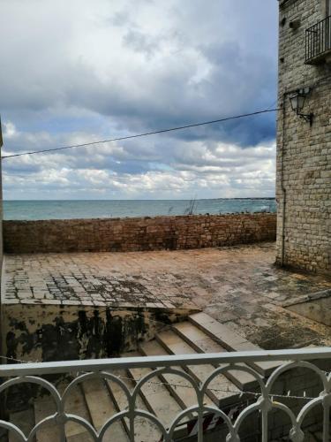 a view of the ocean from a building at B&B VISTAZZURRA - Casa Saldarelli in Giovinazzo