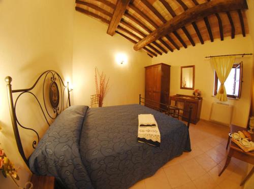 Cama o camas de una habitación en Grand Relais Laurenti