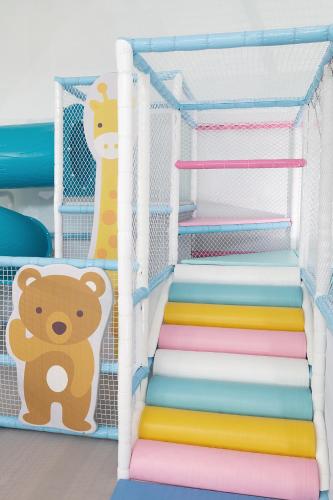 a set of colorful stairs with a bear and giraffe on them at Howard Plaza Hotel Hsinchu in Hsinchu City