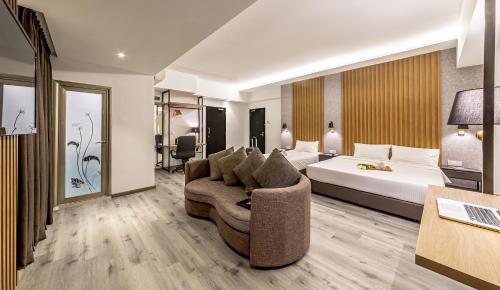 Postel nebo postele na pokoji v ubytování Thy Executive Hotel