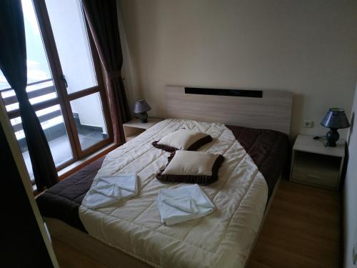 Ski & Holiday Apartments in Pamporovo 객실 침대