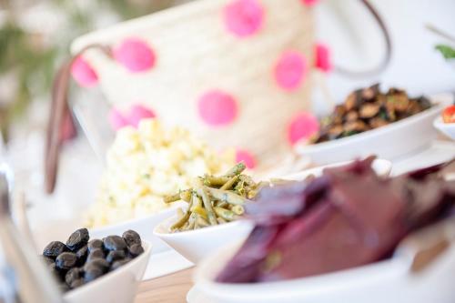 a group of bowls of food on a table at PK25 Dakhla in Dakhla