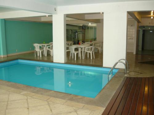 The swimming pool at or close to Altadomo Hotel