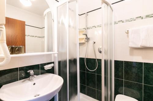 Koupelna v ubytování Albergo Conca Verde