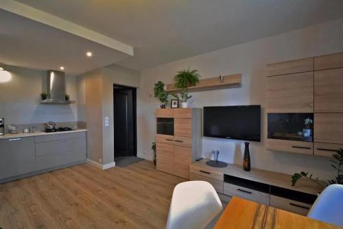 Η κουζίνα ή μικρή κουζίνα στο Apartamenty ZACISZE
