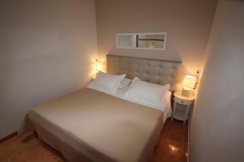 Posteľ alebo postele v izbe v ubytovaní Family Apartment Mirela Borik