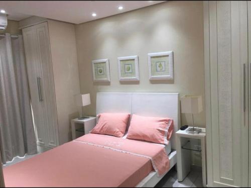 Cama ou camas em um quarto em Apartamento em Resort Ilha da Madeira na Riviera