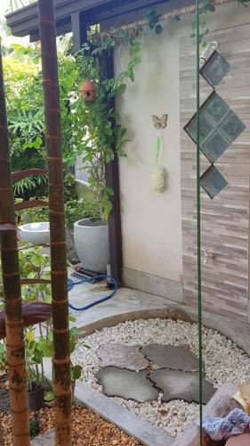 a small garden with a hole in the ground at Villa Prias by Amrea in Aluthgama