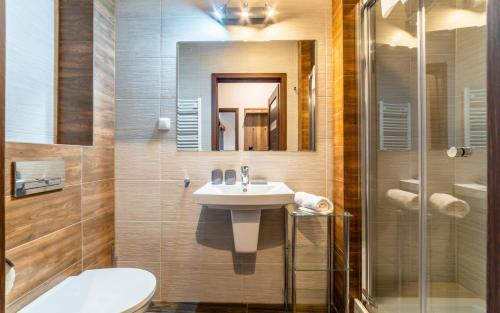 Kúpeľňa v ubytovaní Apartamenty Górski Zakątek Karpacz na Emilii Plater 18C