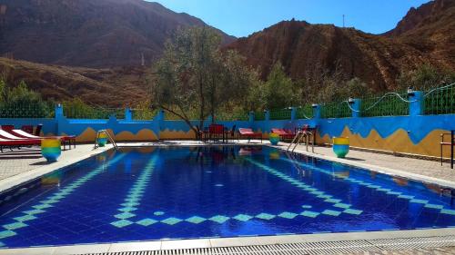 Poolen vid eller i närheten av AUBERGE ROYAL PALMAS