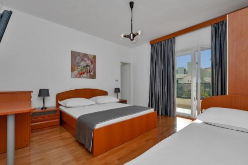 Fotografie z fotogalerie ubytování Apartments Čobrnić v Tučepi