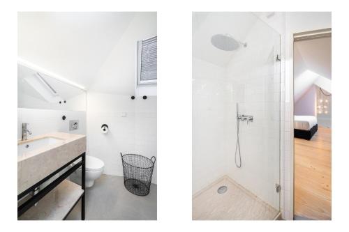 a bathroom with a shower and a sink and a toilet at WHome | LS48 Prime Location Luxury Duplex in Lisbon