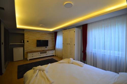 Ліжко або ліжка в номері GV Suites Galata