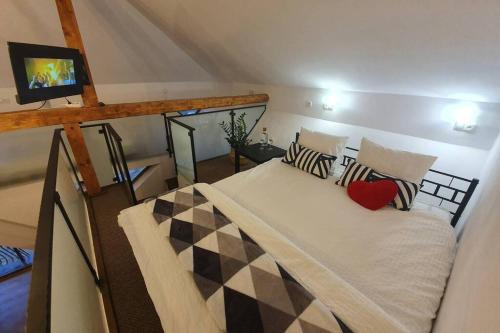 Posteľ alebo postele v izbe v ubytovaní Koci Dom Loft