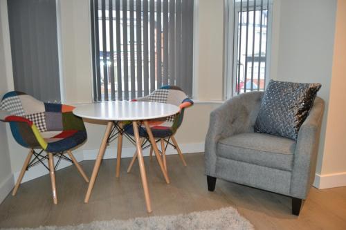 Ein Sitzbereich in der Unterkunft Meadow apartments Nottingham