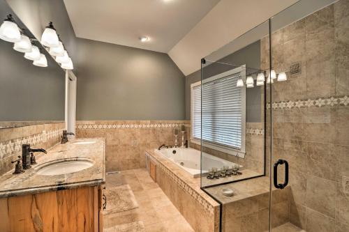 a bathroom with a tub and a sink and a shower at Mountain-View Franklin Retreat: Near Hiking! in Franklin