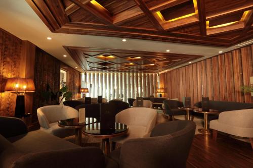 a restaurant with chairs and tables in a room at Le Palace d'Anfa in Casablanca