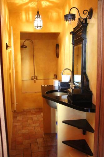 a bathroom with a sink and a shower at Villa Anita in Levanto