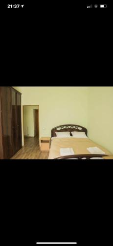Letto o letti in una camera di Готель Баронський Двір