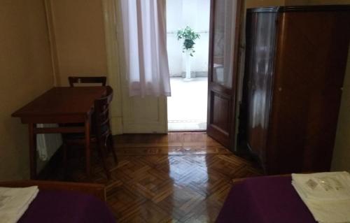 Ένα ή περισσότερα κρεβάτια σε δωμάτιο στο Hotel El Pibe
