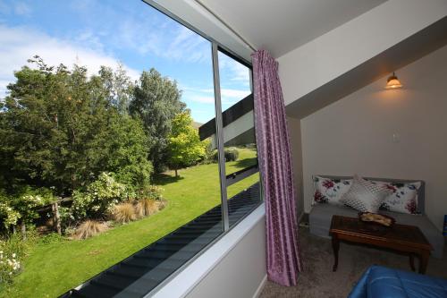 a view from the balcony of a house at Star Dream Manor in Lake Tekapo