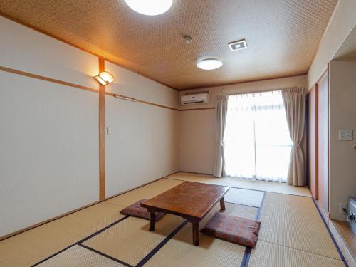 Χώρος καθιστικού στο Tabist Yamaga Onsen Yuyado Izumi