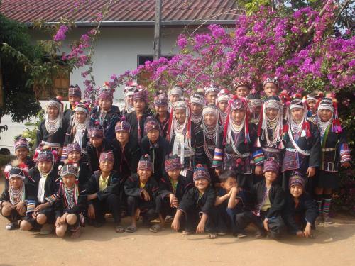a large group of people posing for a picture at Pa Sak Tong in Chiang Rai