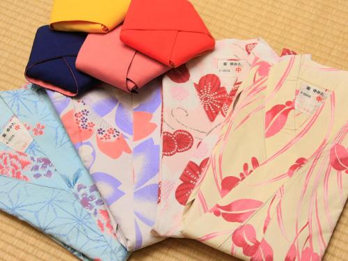 a pile of ties sitting on top of a table at Ginshotei Awashima in Numata