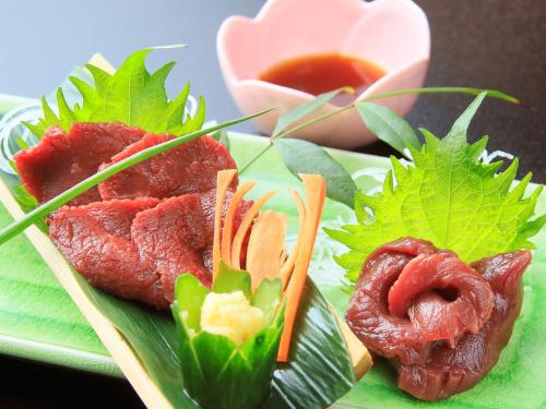 a plate of food with meat and vegetables on it at Ginshotei Awashima in Numata