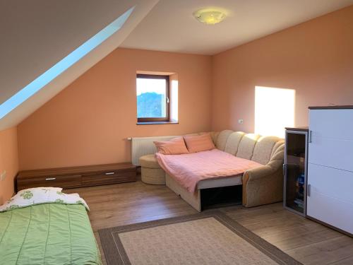 A bed or beds in a room at Farmhouse Lipoglav