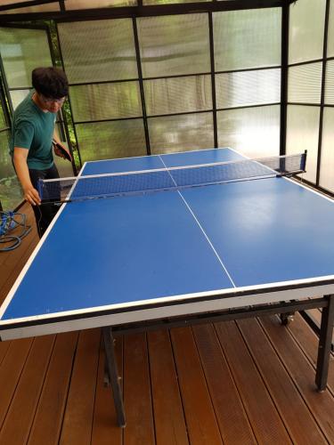 Tischtennis in der Unterkunft Solnanggu Pension oder in der Nähe