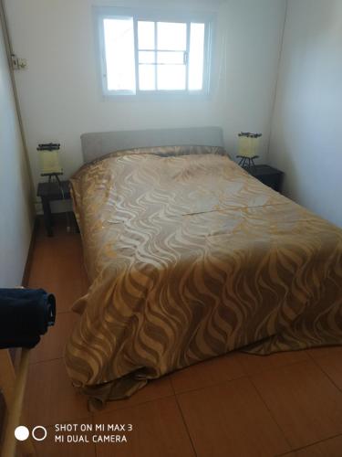 En eller flere senge i et værelse på Avalon Apartment 2