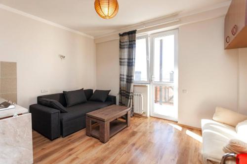 Zona de estar de Wehost Cozy and Comfortable Studio