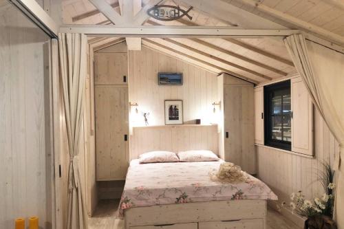 Ένα ή περισσότερα κρεβάτια σε δωμάτιο στο Camping le Marache