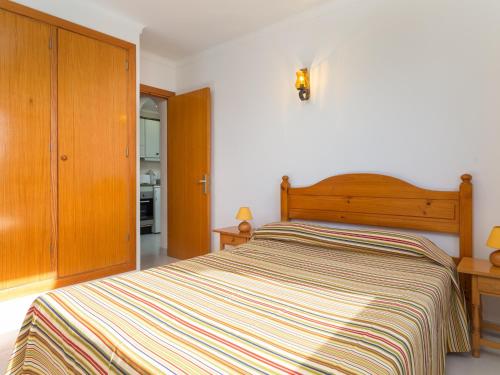 A bed or beds in a room at Voramar 2g