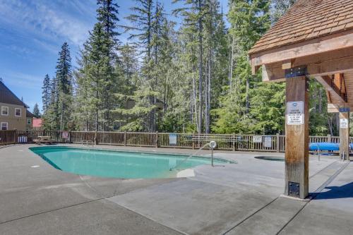a swimming pool in a yard with a house at Collins Lake #112 in Government Camp