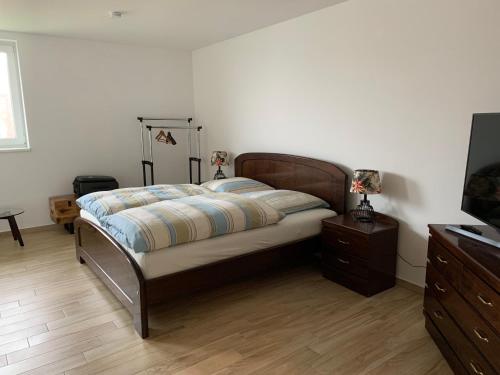 Llit o llits en una habitació de Gästehaus Residenz Aurora