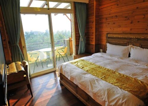 Postel nebo postele na pokoji v ubytování Zen and Pine Resort