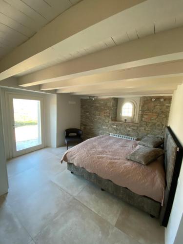 Un pat sau paturi într-o cameră la Borgo Stanzano