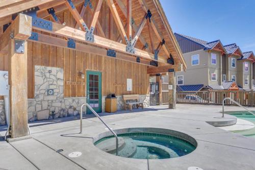 a building with a hot tub in a courtyard at Collins Lake #41 in Government Camp