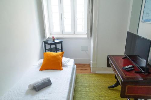 TV a/nebo společenská místnost v ubytování Guest House Amoreiras