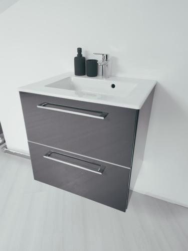 a bathroom vanity with a sink and a white counter at Maison familiale tout confort avec garage in Lompret