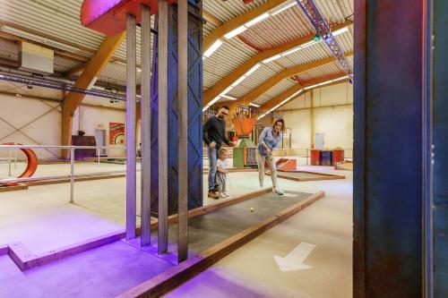 a group of people playing bowling in a gym at Center Parcs Sauerland Winterberg-Medebach in Medebach