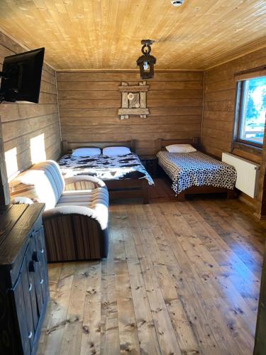 Ένα ή περισσότερα κρεβάτια σε δωμάτιο στο Eco House