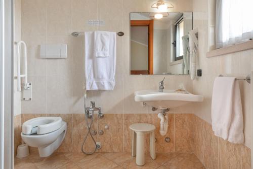 Koupelna v ubytování Hotel Postumia