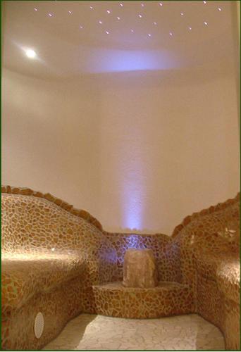 a bathroom with a toilet in a room at Hotel Gasthof Buchbauer in Bad Sankt Leonhard im Lavanttal