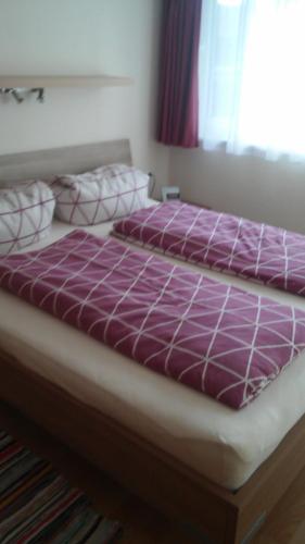 Posteľ alebo postele v izbe v ubytovaní Ferienwohnung Kogler