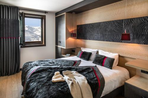 Katil atau katil-katil dalam bilik di Residence Montana Plein Sud