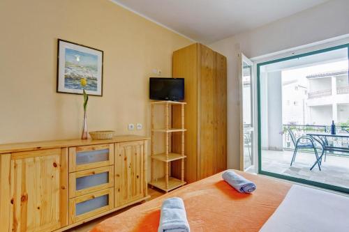 Posteľ alebo postele v izbe v ubytovaní Beach Apartments Anton